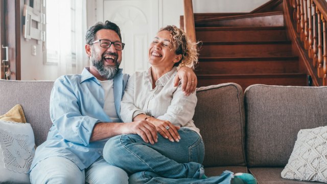 a picture of a couple laughing together, which is a sign of a healthy relationship