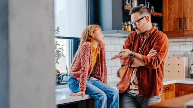 daughter and dad arguing in the kitchen