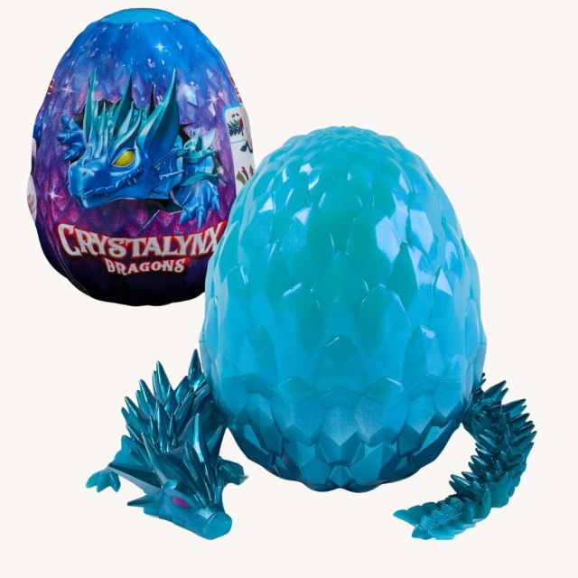 two plastic dragon egg toys with slinky dragon toy inside