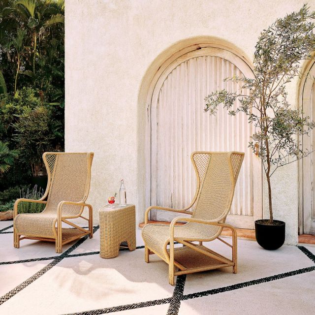 set of 2 outdoor wicker wingback chairs on patio