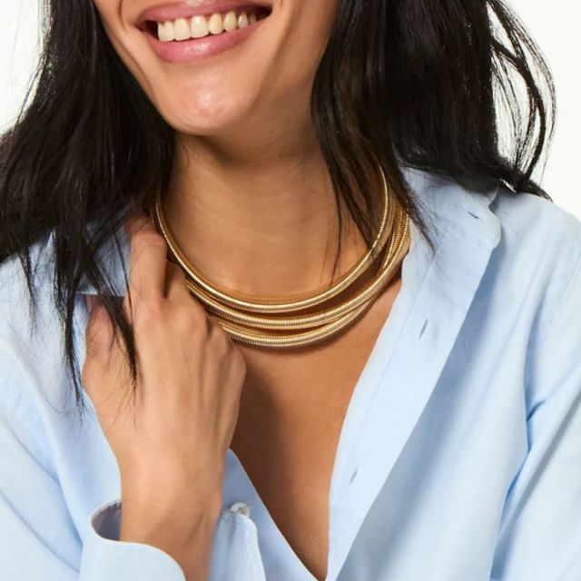 person wearing the necklace