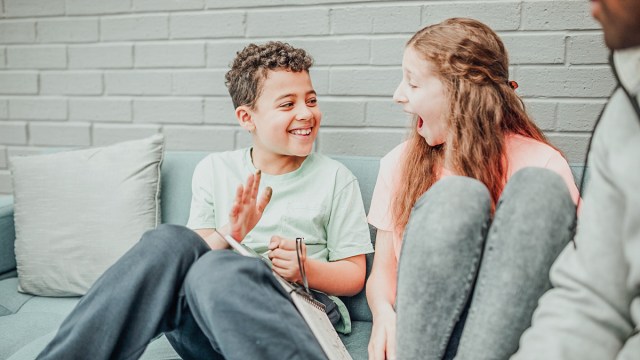 a tween boy and girl about to play the fire truck game