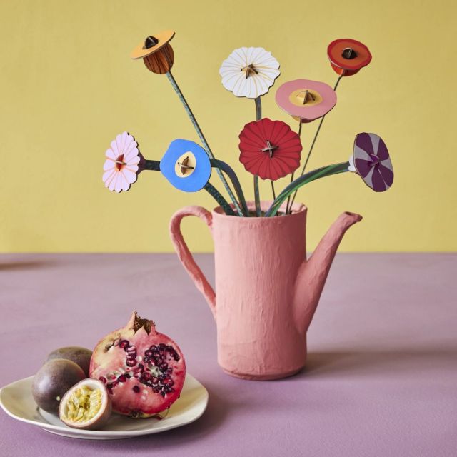 the DIY flowers in a watering can