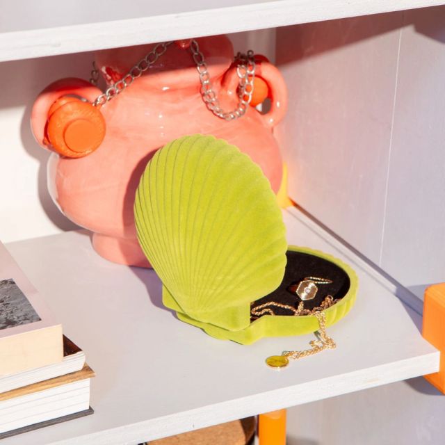 the jewelry box open on a shelf