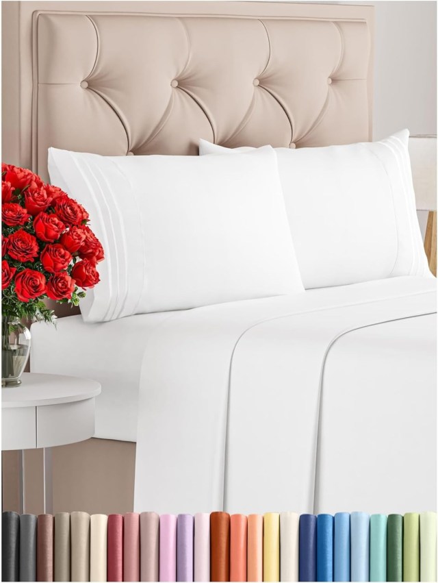 a bed with white sheets