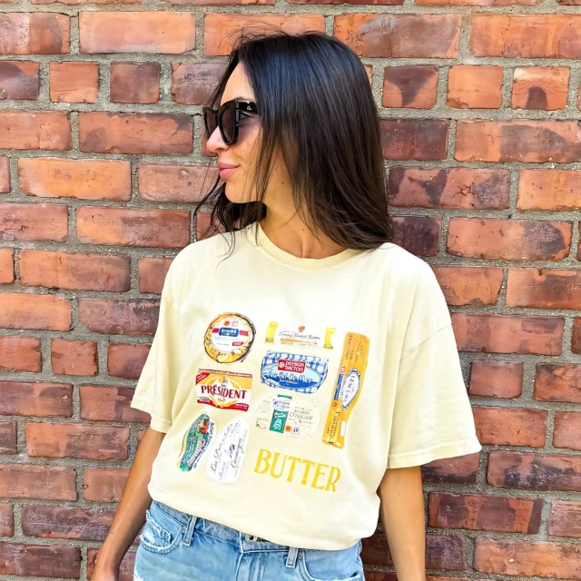 person wearing the butter t-shirt