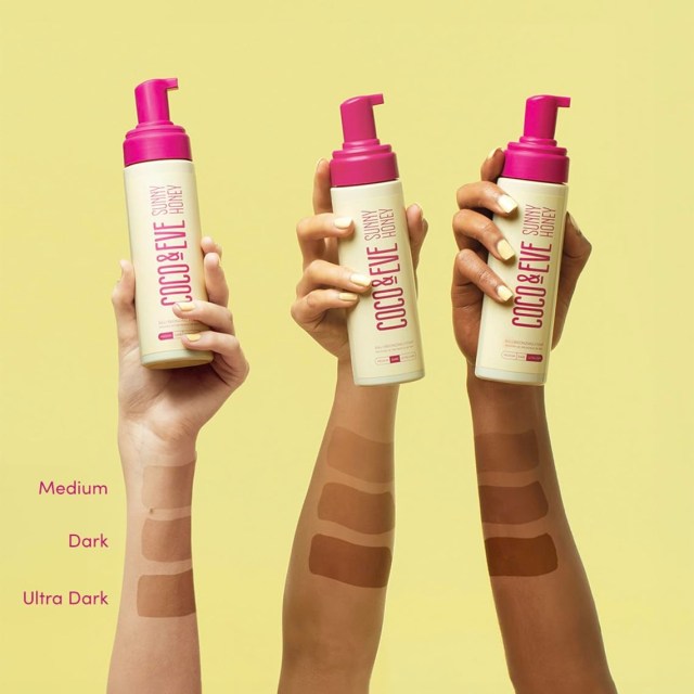three hands holding bottles of self tanner