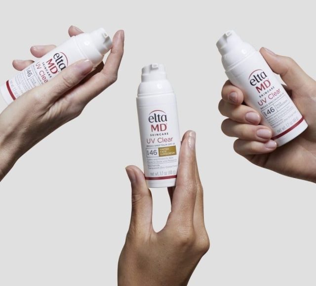 three hands holding EltaMD sunscreen