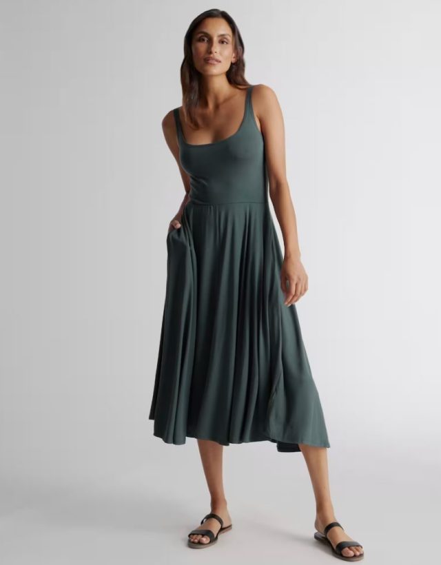 person wearing the dark green dress