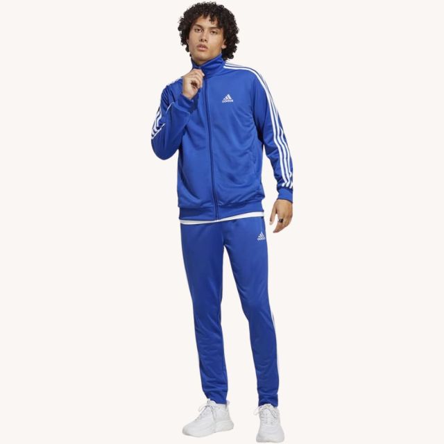 man wearing blue adidas tracksuit