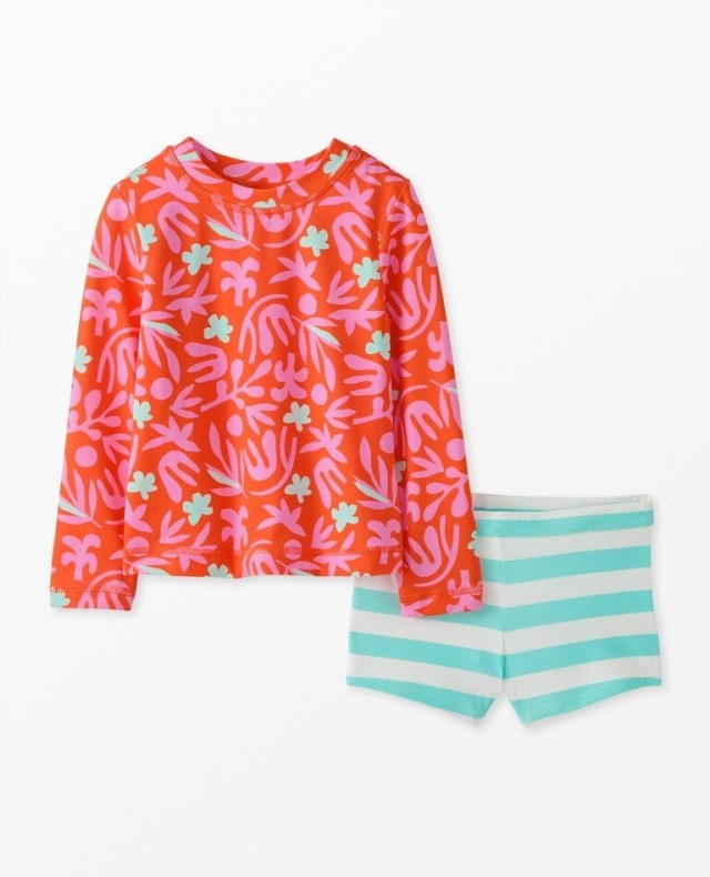a bright swim trunk and rashguard set for kids