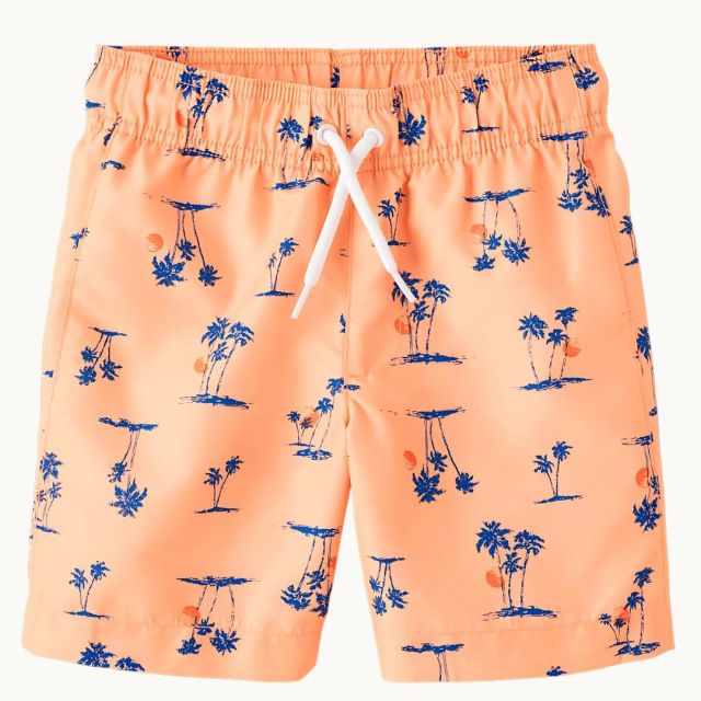 orange kids' swim trunks with blue palm tree pattern