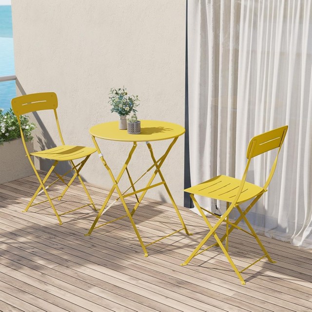 yellow bistro set on a patio
