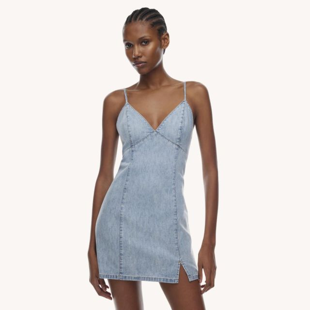 woman wearing denim slip dress