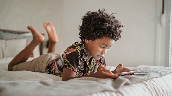 kid on his iphone