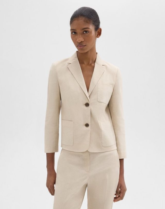 woman in beige blazer