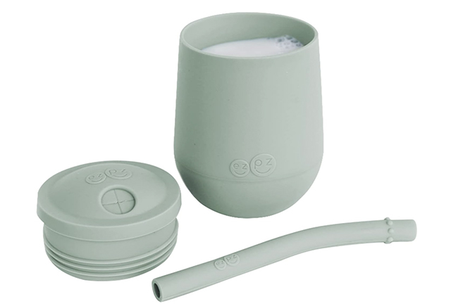 When can babies have water? At six months they can start trying tiny sips from a cup like ezpz's mini cup and straw training system