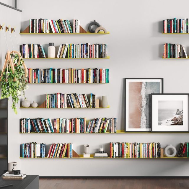 wall of floating bookshelves