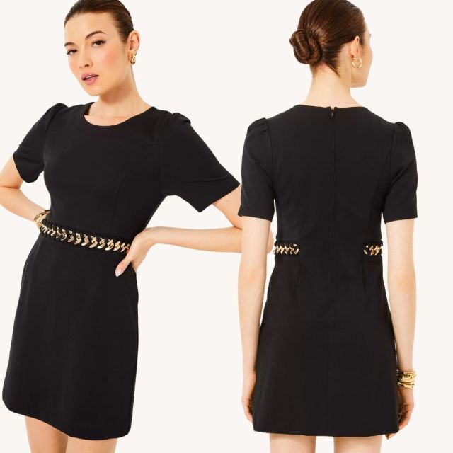 woman wearing black shift dress