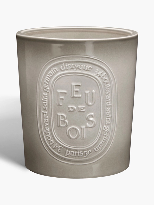 An extra-large Diptyque candle in feu de bois scent is one of our favorite expensive gifts for mother's day