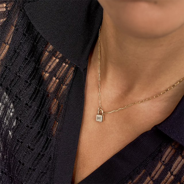 Oak and Luna's Initial Lock Necklace is one of our favorite expensive gifts for Mother's Day