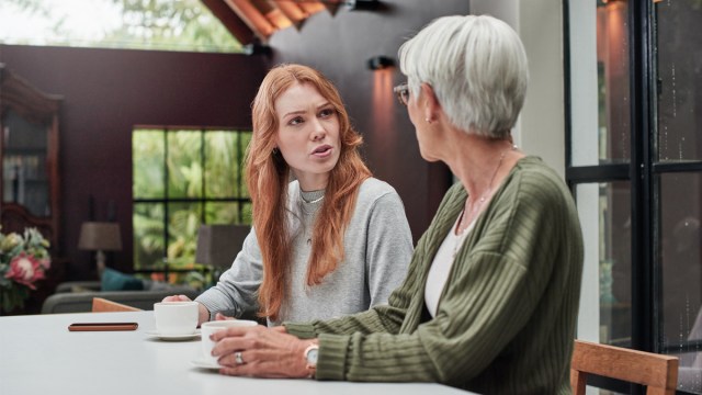 a grandmother talking to her daughter and giving unwanted parenting advice