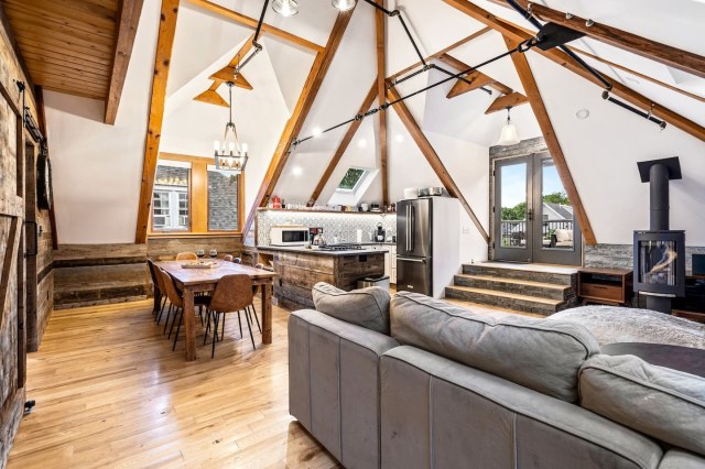 a loft apartment with an open concept