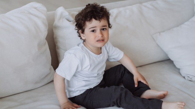 How to get kids to stop whining, like this whiny toddler sitting on the couch
