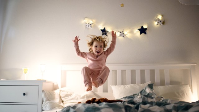 a picture of a kid who is wired before bedtime