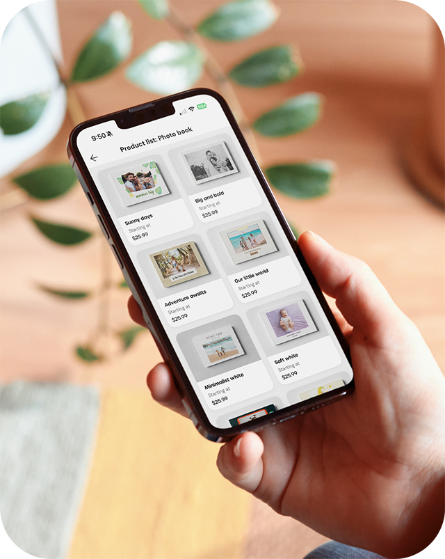 Photo book designs on a phone in the new Tinybeans photo store