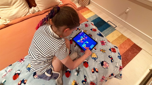 My daughter playing games to give her ABCmouse review