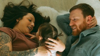 A family cuddle session makes for some adorable photos and is one of our favorite faceless photo ideas