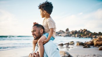 a dad kids remember holding his kid on his shoulders