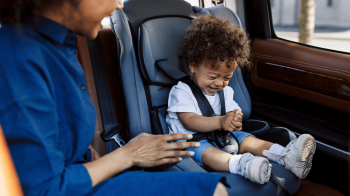 mom checking her road trip with baby checklist